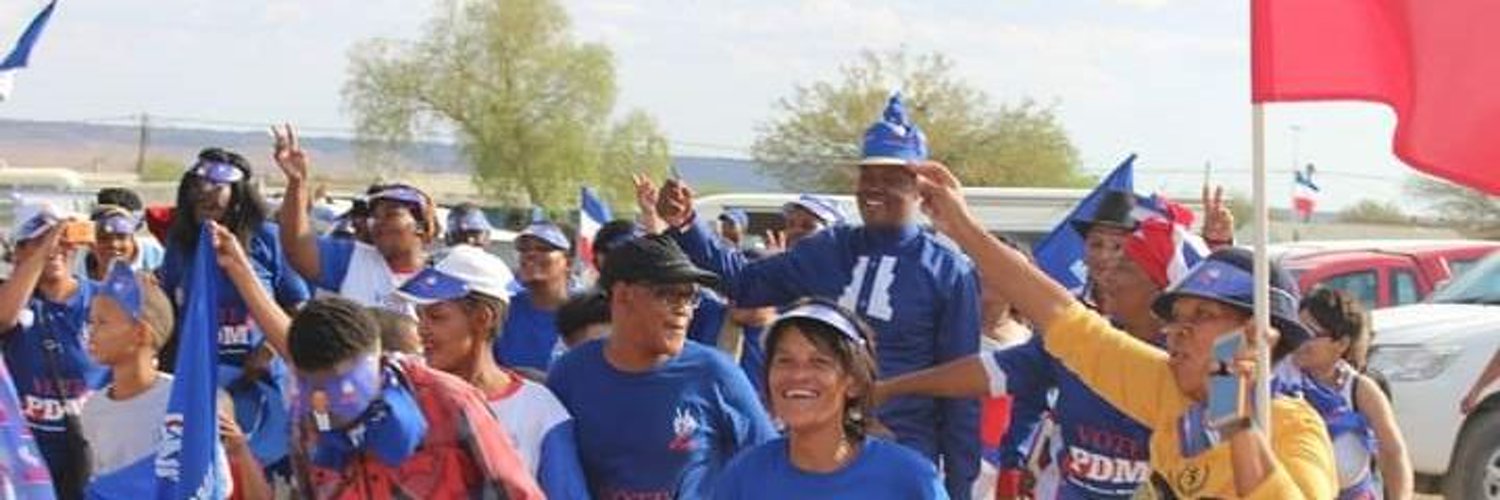 PDM Namibia supporters gathered beneath the Popular Democratic Movement banner